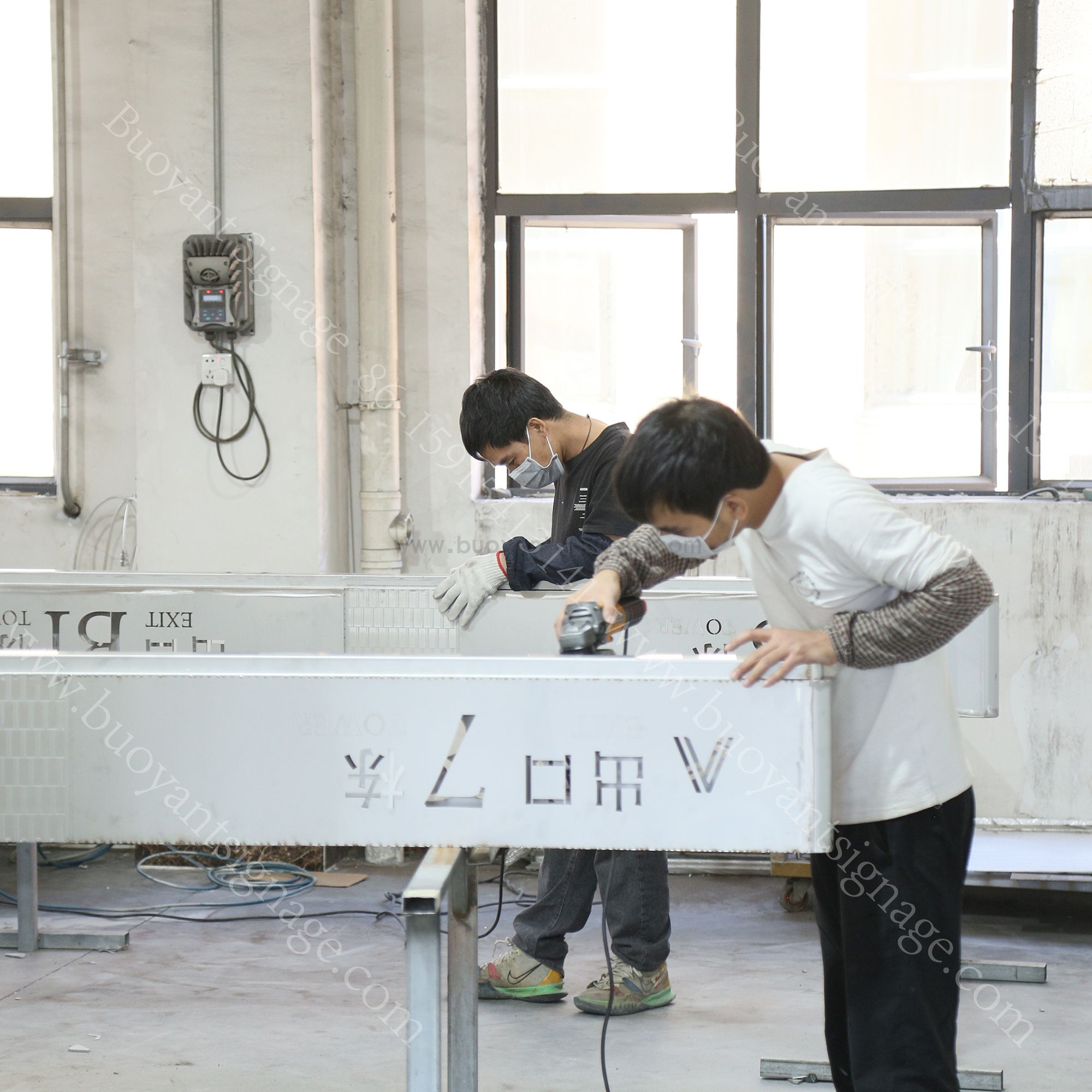 Custom Metal Wayfinding Signage Production Moves Forward at Our Factory